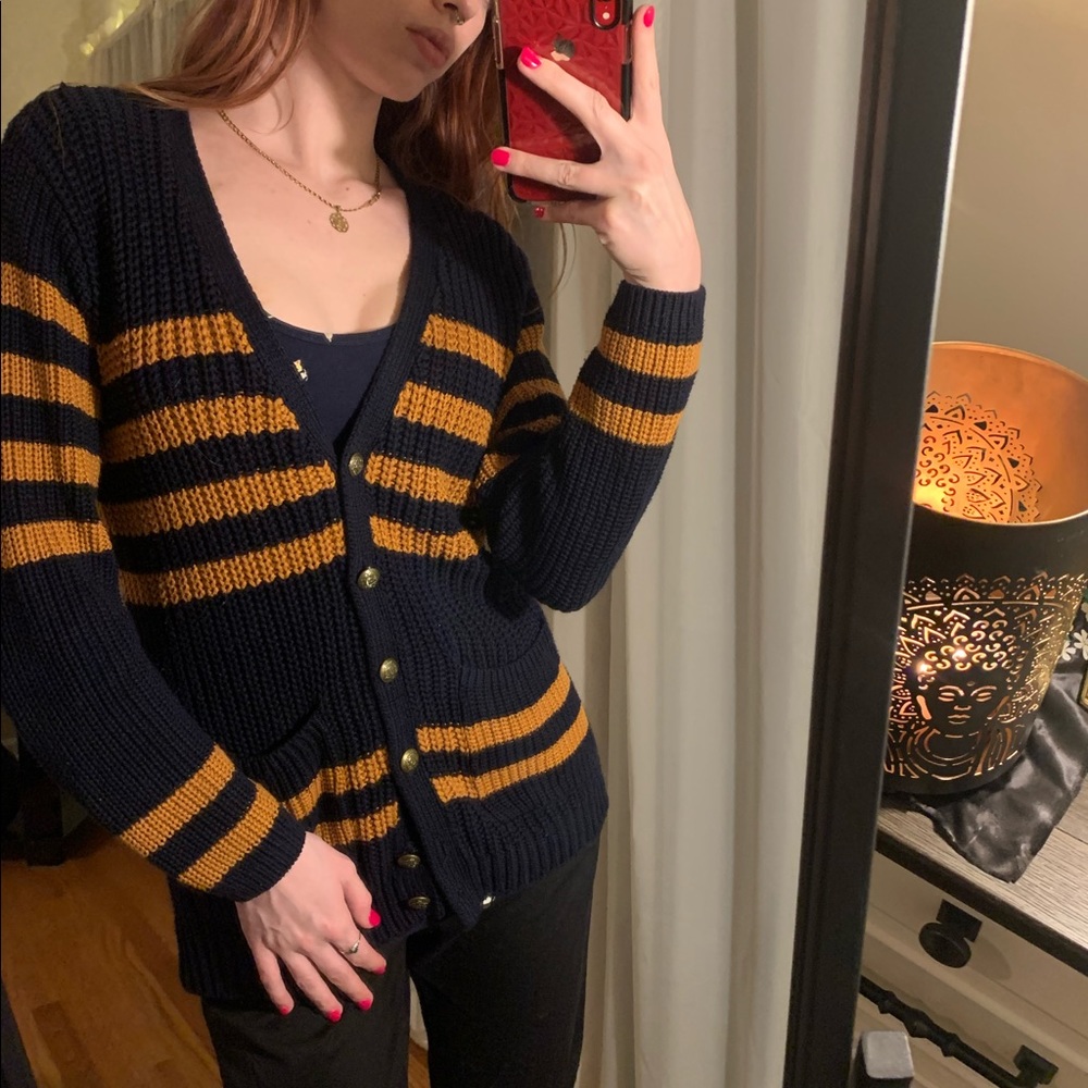 Knitted navy blue sweater.